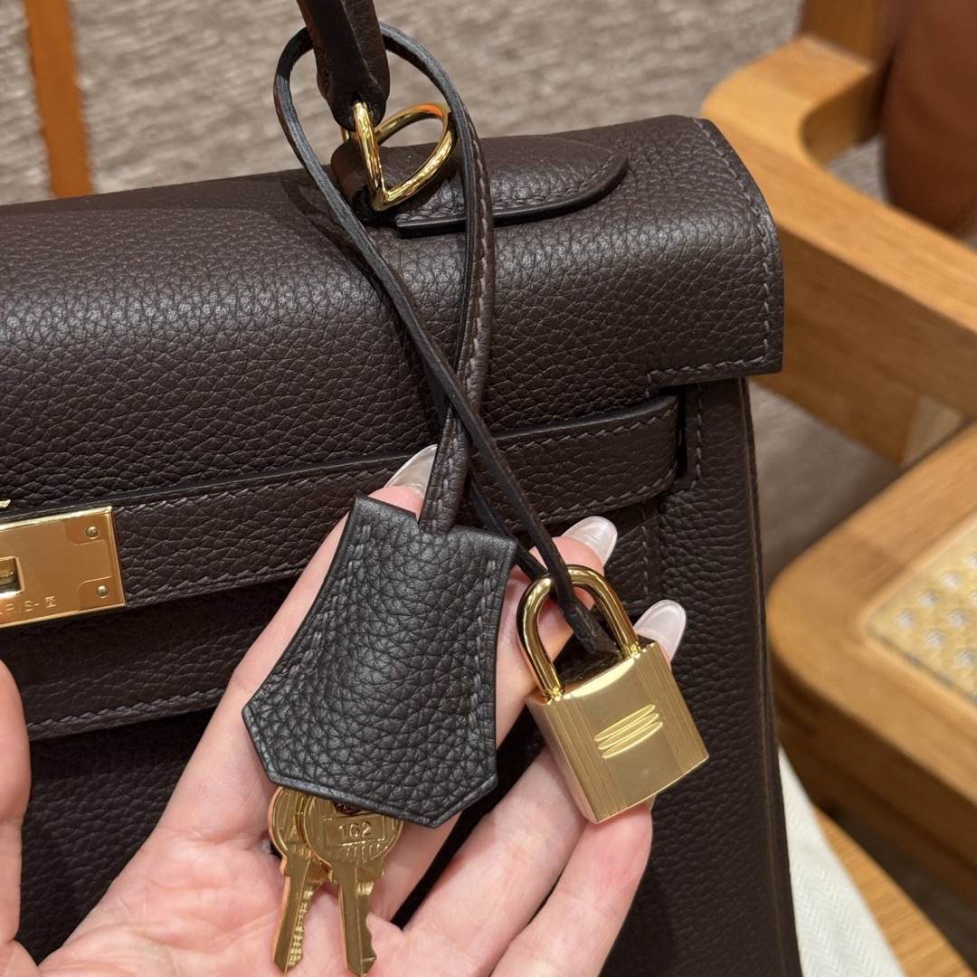 Kelly 28cm, black, French imported cowhide, with gold hardware inside stitching.