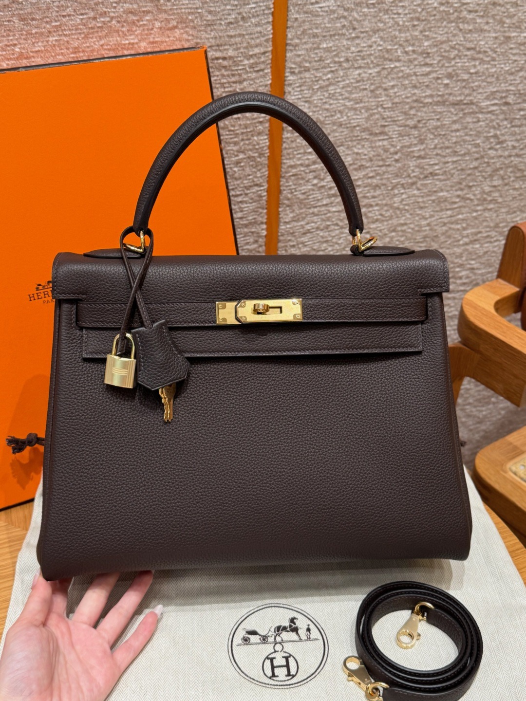 Kelly 28cm, black, French imported cowhide, with gold hardware inside stitching.