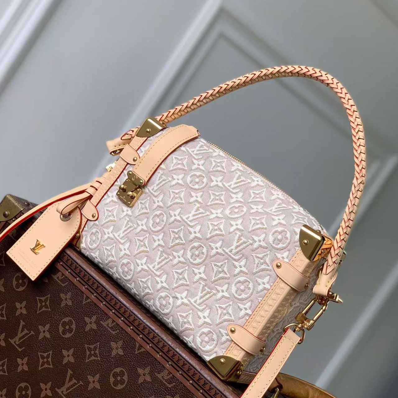LV light white relief old flower woven hand-held hard box crossbody bag