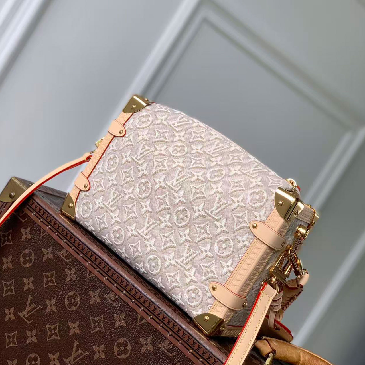 LV light white relief old flower woven hand-held hard box crossbody bag