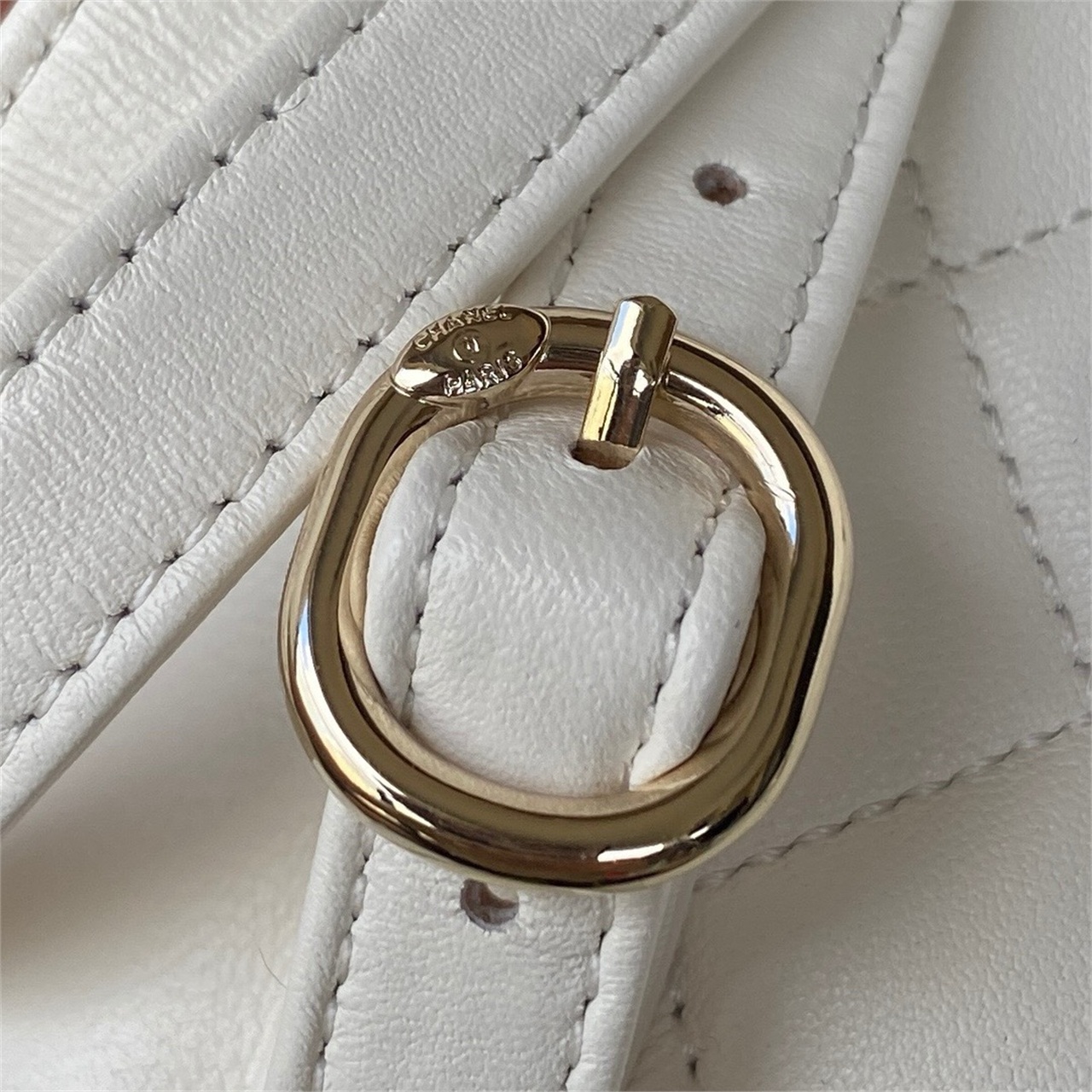 CHANEL beige lambskin diamond grid mini backpack