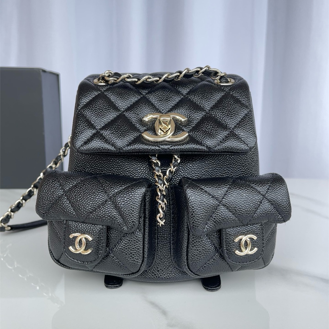 CHANEL black caviar cowhide three pocket mini backpack