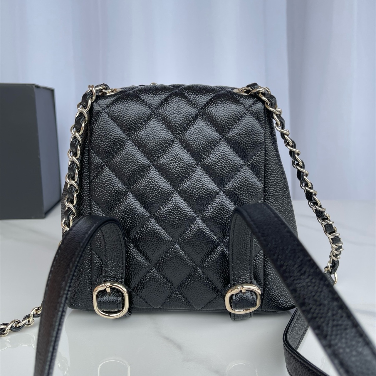 CHANEL black caviar cowhide three pocket mini backpack