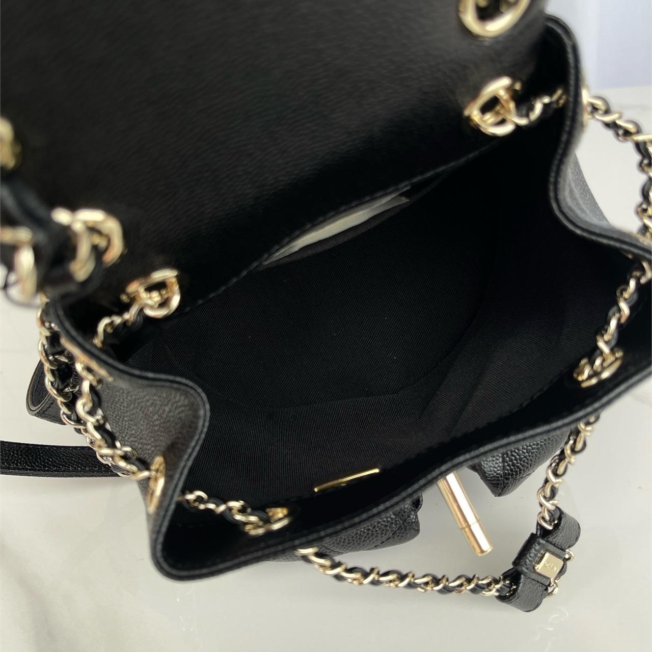 CHANEL black caviar cowhide three pocket mini backpack