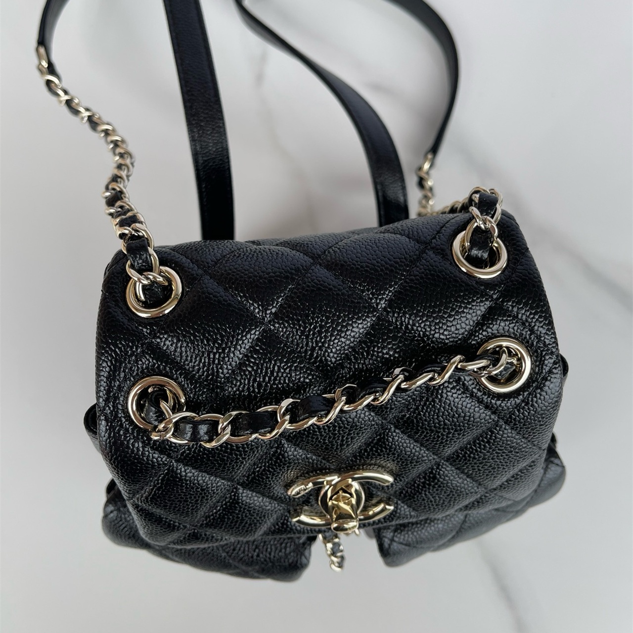 CHANEL black caviar cowhide three pocket mini backpack