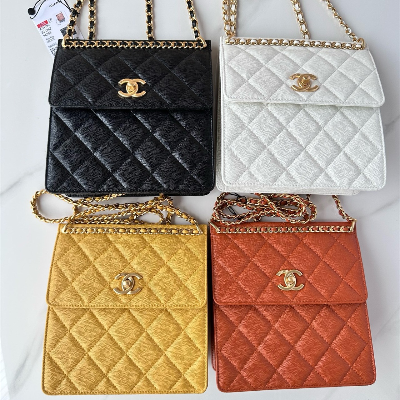 CHANEL white caviar cowhide gold buckle vertical square box chain bag
