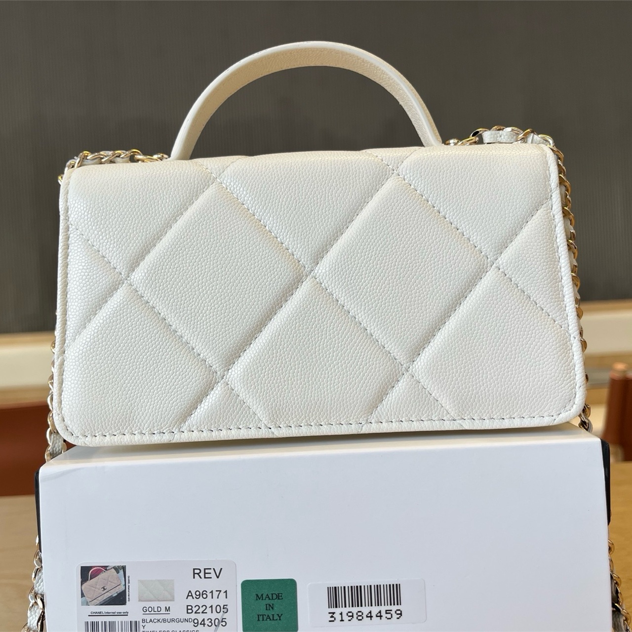 CHANEL Milk White Caviar Cowhide Handheld WOC Chain Bag