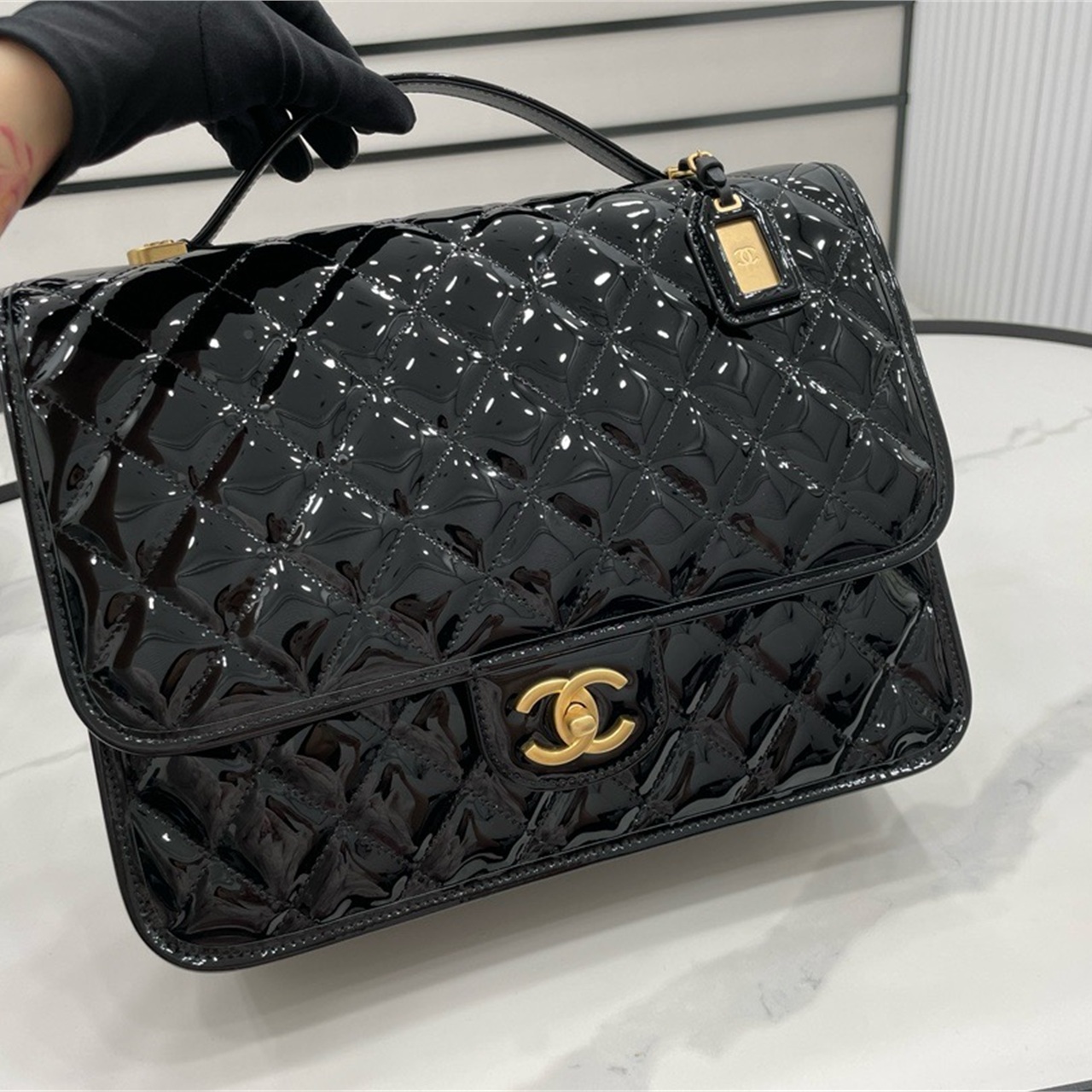 CHANEL shiny black patent leather diamond grid hand-held document mailman bag