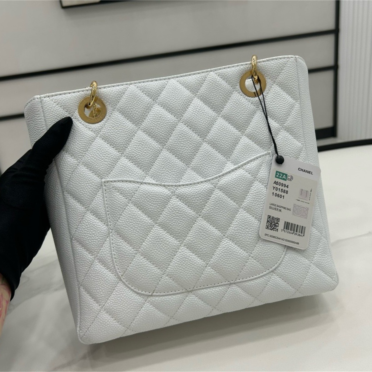 CHANEL milk white caviar cowhide embossed double C vertical tote chain bag