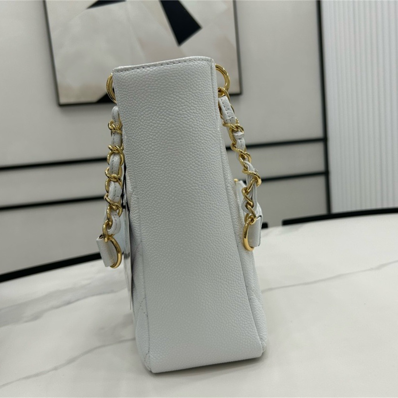 CHANEL milk white caviar cowhide embossed double C vertical tote chain bag