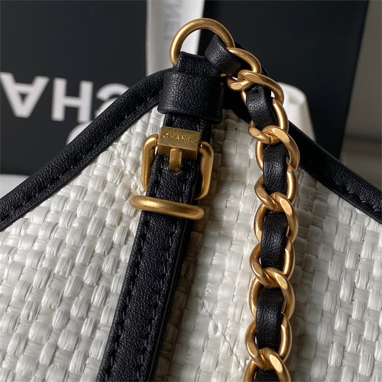 CHANEL white grass woven black leather drawstring tote chain bag