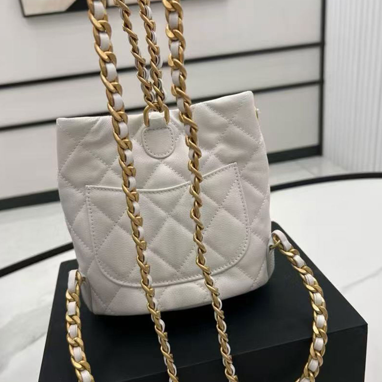 CHANEL milk white caviar diamond grid mini mother and child drawstring bucket bag