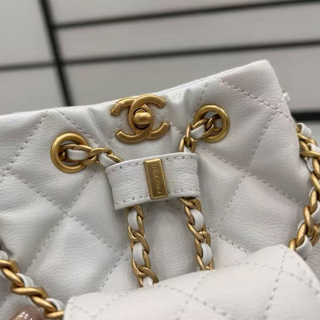 CHANEL milk white caviar diamond grid mini mother and child drawstring bucket bag