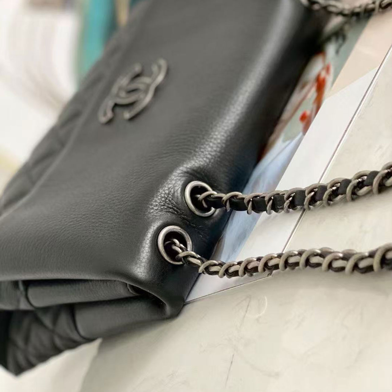 CHANEL black grain cowhide splicing diamond grid flip chain bag