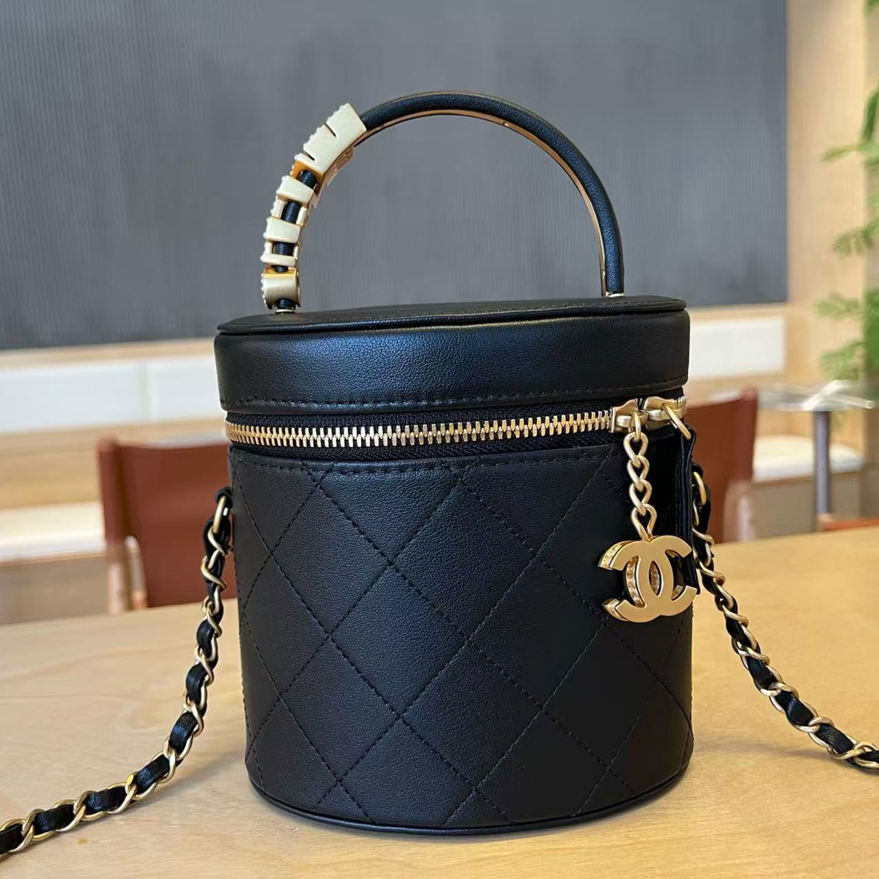 CHANEL black glossy cowhide diamond grid cylindrical makeup bucket bag