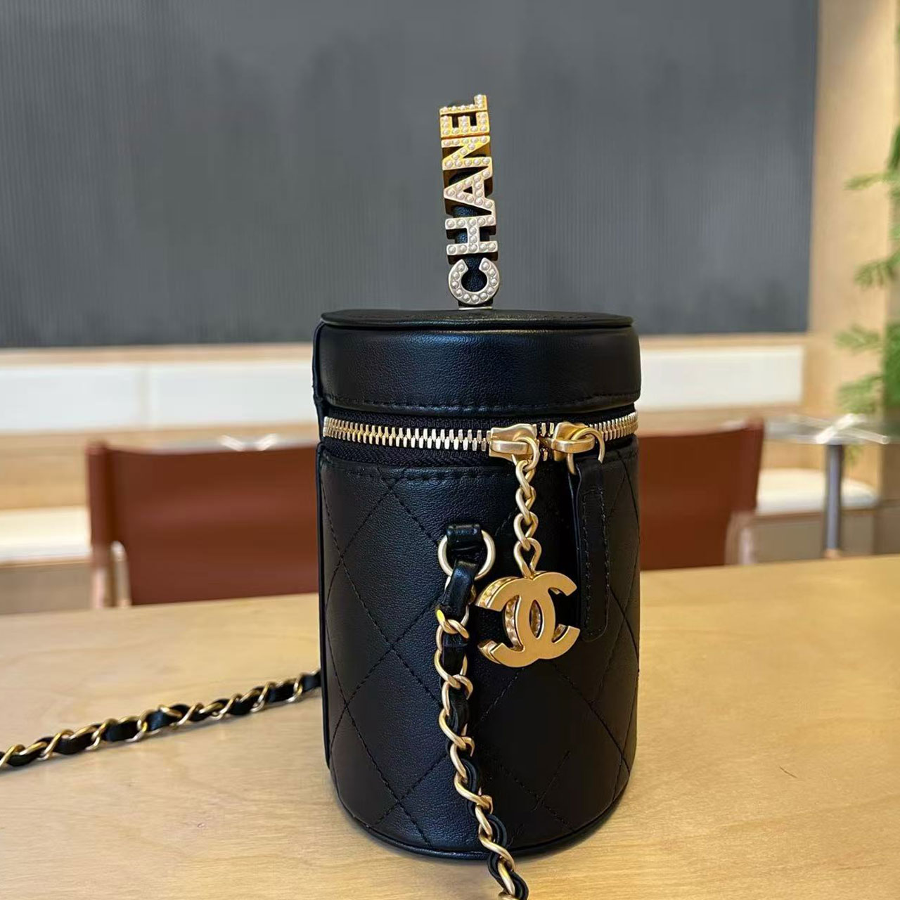 CHANEL black glossy cowhide diamond grid cylindrical makeup bucket bag
