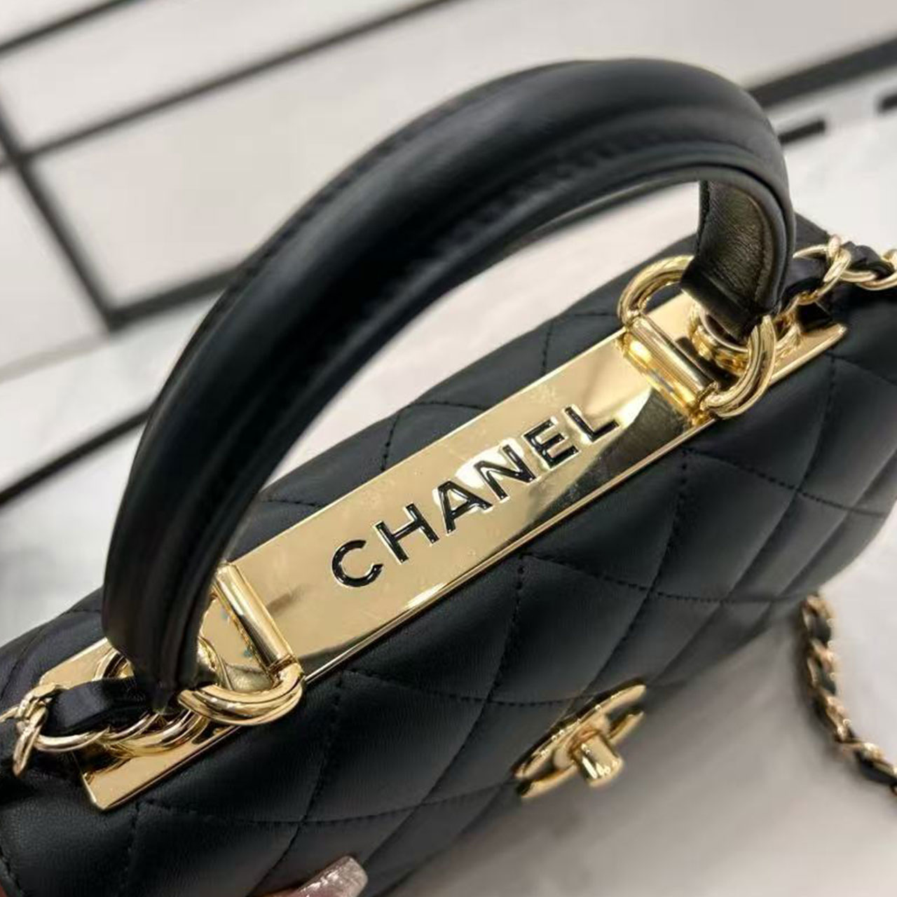 CHANEL Black Soft Light Sheepskin Handheld Square Box Flip Chain Bag