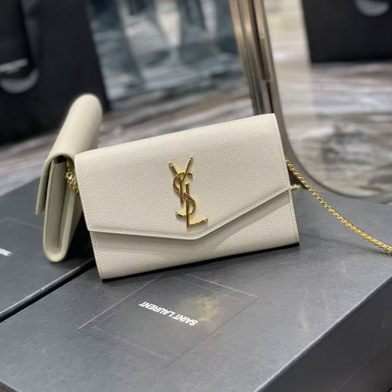 YSL 𝑈𝑝𝑡𝑜𝑤𝑛 _ Mini envelope package