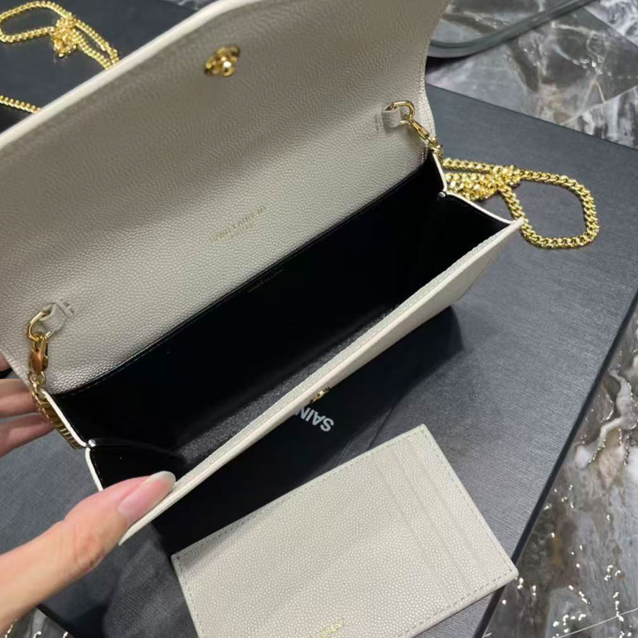 YSL 𝑈𝑝𝑡𝑜𝑤𝑛 _ Mini envelope package