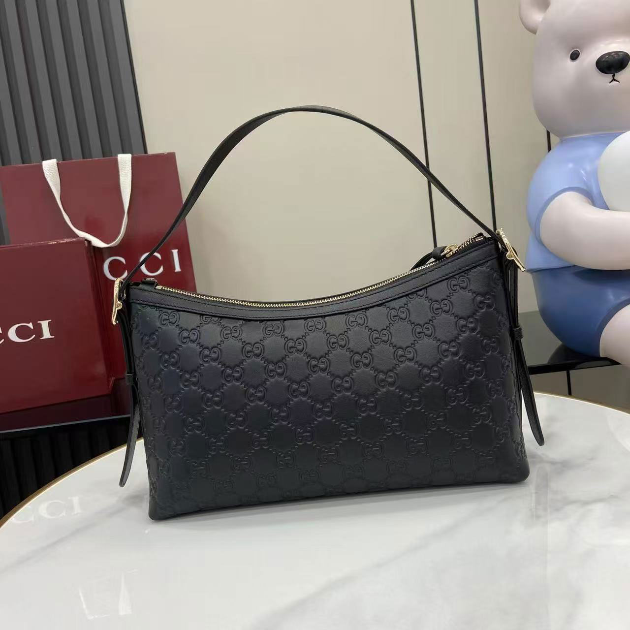 Gucci Emblem Series Medium Shoulder Backpack